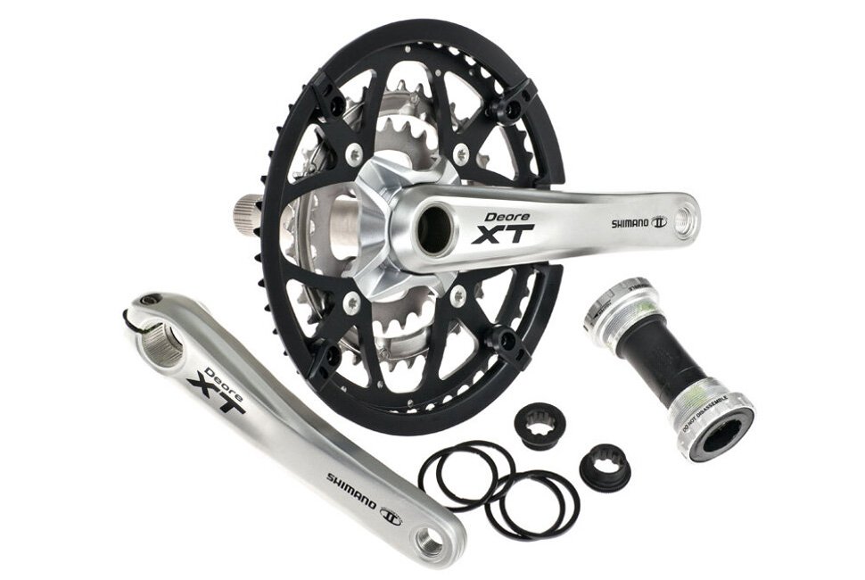 Система шатунов Shimano Deore XT FC-M771K, 48x36x26T, 175мм, Hollowtech2 с кареткой, чёрно-серый (без защиты), 580037
Система шатунов Shimano Deore XT FC-M771K, 48x36x26T, 175мм, Hollowtech2 с кареткой, чёрно-серый (без защиты), 580037