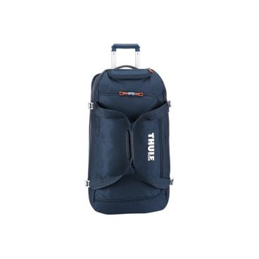 Багажная сумка Thule Crossover 56L Rolling Duffel на колесах, синий 3201093 Багажная сумка Thule Crossover 56L Rolling Duffel на колесах, синий 3201093Велосумки<br>Большая и вместительная дорожная сумка на колесах Thule Crossover 87L. Благодаря широкому входу на молнии и достаточной вместительности в 56 л. в эту сумку можно с легкостью положить любые горнолыжные или туристические принадлежности.<br>Описание<br><br>Алюминиевый каркас и водостойкий материал делают эту сумку легкой и прочной.<br>Надежный экзоскелет и задняя обшивка из полипропилена обеспечат надежную защиту во время путешествий в самых сложных условиях.<br>Крепкие колеса увеличенного размера и телескопические ручки с технологией Thule V-Tubing™ гарантируют мягкое, плавное и ровное движение в течение многих лет.<br>Регулировочные ремни для подгонки размера сумки в зависимости от количества багажа.<br>Изготовленное по технологии горячей прессовки ударопрочное отделение SafeZone™ защитит ваши очки, портативную электронику и другие хрупкие вещи (отделение прикрепляется и может быть удалено для освобождения дополнительного места).<br>Главное отделение с несколькими отсеками поможет отделить чистое от грязного, мокрое от сухого и деловое от повседневного.<br><br><br>Характеристики<br> <br>Цвет: синий<br>Возможные цвета: чёрный, синий<br>Внешние размеры (высота, длинна, глубина):64 x 38 x 32,5 см<br>Вес: 3.5 кг<br>Вместимость: 56 л<br>Материалы:нейлон (Dobby nylon)<br>Гарантия: 25 лет<br>