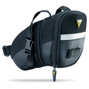 Подседельная велосумка TOPEAK Aero Wedge Pack w/strap mount MEDIUM TC2261B Подседельная велосумка TOPEAK Aero Wedge Pack w/strap mount MEDIUM TC2261BВелосумки<br>Подседельная велосумка Topeak Aero Wedge Pack with traditional strap mount. Качественная велосумка под седло. Светоотражающие элементы, удобное ремешковое крепление.<br><br>Тип крепления: подседельная<br>Материал: нейлон, полиэстер<br>Объем: 0.98-1.31 л<br>Вес: 130 г<br>Габариты (ДxШxВ): 20 x 11 x 12 см<br>Артикул: TC2261<br>