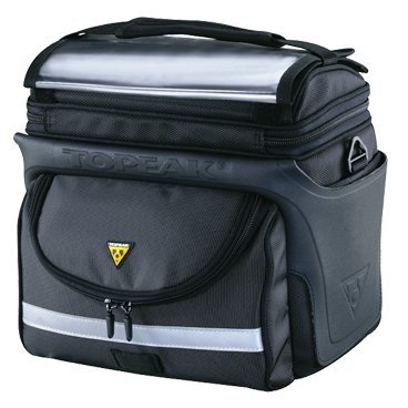 Сумка на руль TOPEAK TourGuide DX, прозрачный планшет под карту в комплекте TT3022B Сумка на руль TOPEAK TourGuide DX, прозрачный планшет под карту в комплекте TT3022BВелосипедные рюкзаки и сумки<br>Практичная велосипедная сумка, которая крепиться на руль из водонепроницаеиого нейлона. Одно отделение внутри с двумя боковыми карманами. Крепление к рулю Fixer8, которое находится на задней панели сумки. Процесс крепления занимает всего несколько секунд. Уплотнитель по всему периметру сумки. Передний карман с фиксатором для фонарика и светоотражающей лентой. В комплекте с сумкой идет плотный пластиковый пакет для карты или документов, съемный ремешок и защитный чехол. Отличный выбор для тех, кто любит велопрогулки с дорогой техникой.<br>