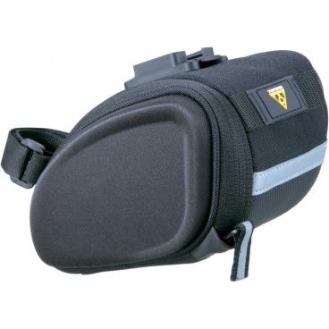 Подседельная велосумка TOPEAK SideKick STW Wedge Pack, с креплением F25, TC2275B Подседельная велосумка TOPEAK SideKick STW Wedge Pack, с креплением F25, TC2275BВелосумки<br>Цвет : Черный<br><br>Крепление: QuickClick (F25) к рамкам седла и ремень на подседельный штырь<br><br>Емкость: 0.7 л<br><br>Материал: Нейлон, пена<br><br>Размер: 18 x 11 x 11.5 cм<br><br>Вес: 190 г<br><br>Имеет основное отделение, с открывающийся сбоку панелью, благодаря которой вы получаете быстрый доступ ко всему содержимому<br><br>Внутренние сетчатые карманы сохранят мелкие вещи на месте во время катания<br><br>Новый тип конструкции сумки: боковые панели выполнены из прессованной пены в сочетании с эластичной тканью<br><br>Влагостойкая<br><br>Светоотражающая полоса 3М<br><br>Крепление для мигалки Topeak RedLite<br>