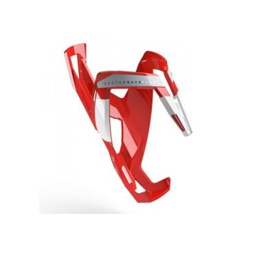 Велосипедный флягодержатель Elite Custom Race Plus, fiberglass, красный, белый рисунок. EL0140616 Велосипедный флягодержатель Elite Custom Race Plus, fiberglass, красный, белый рисунок. EL0140616Фляги и Флягодержатели<br>Флягодержательль Custom Race Plus, fiberglass, красный, белый рисунок<br>Флягодержатель Elite Custom Race Plus является эталоном среди гоночных флягодержателей и используется командами Про-Тура. <br>Новая запатентованная конструкция с более прочным захватом облегчает вставку / извлечение бутылки в экстремальных условиях.<br>Разработано и протестировано в сотрудничестве с лучшими в мире профессиональными командами.<br>Отличительные особенности<br>Флягодержатель для профессионалов велогонок<br>Выполнен из армирвоанного полиамида (FRP) с отделкой из окрашенного стекловолокна<br>Вставка из эластомера адаптируется к форме и размеру фляги<br>Отсутствие вибраций на неровностях трассы<br>Прочная, лёгкая и гибкая современная конструкция<br>Подходит для любого типа велосипедов<br>