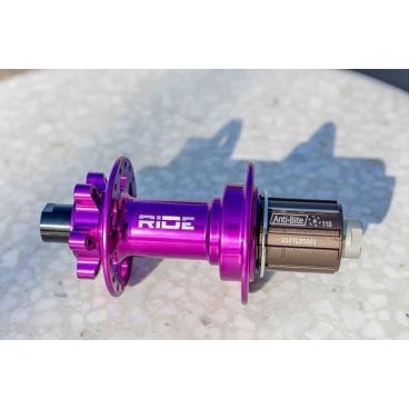 Втулка задняя RIDE Boost 28h 12x148 Anti Bite Purple, BX211RPUR28